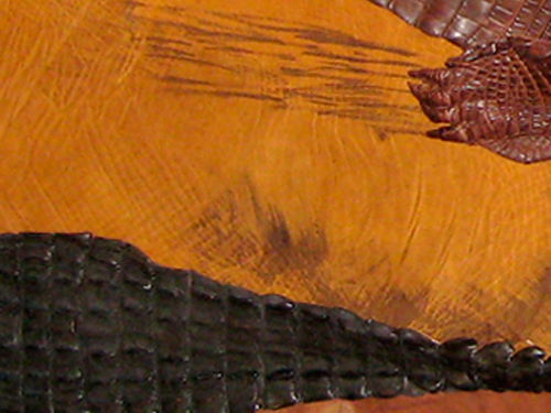 Close up detail of the crocodile skin in Confrontation by Beatrix Bosch